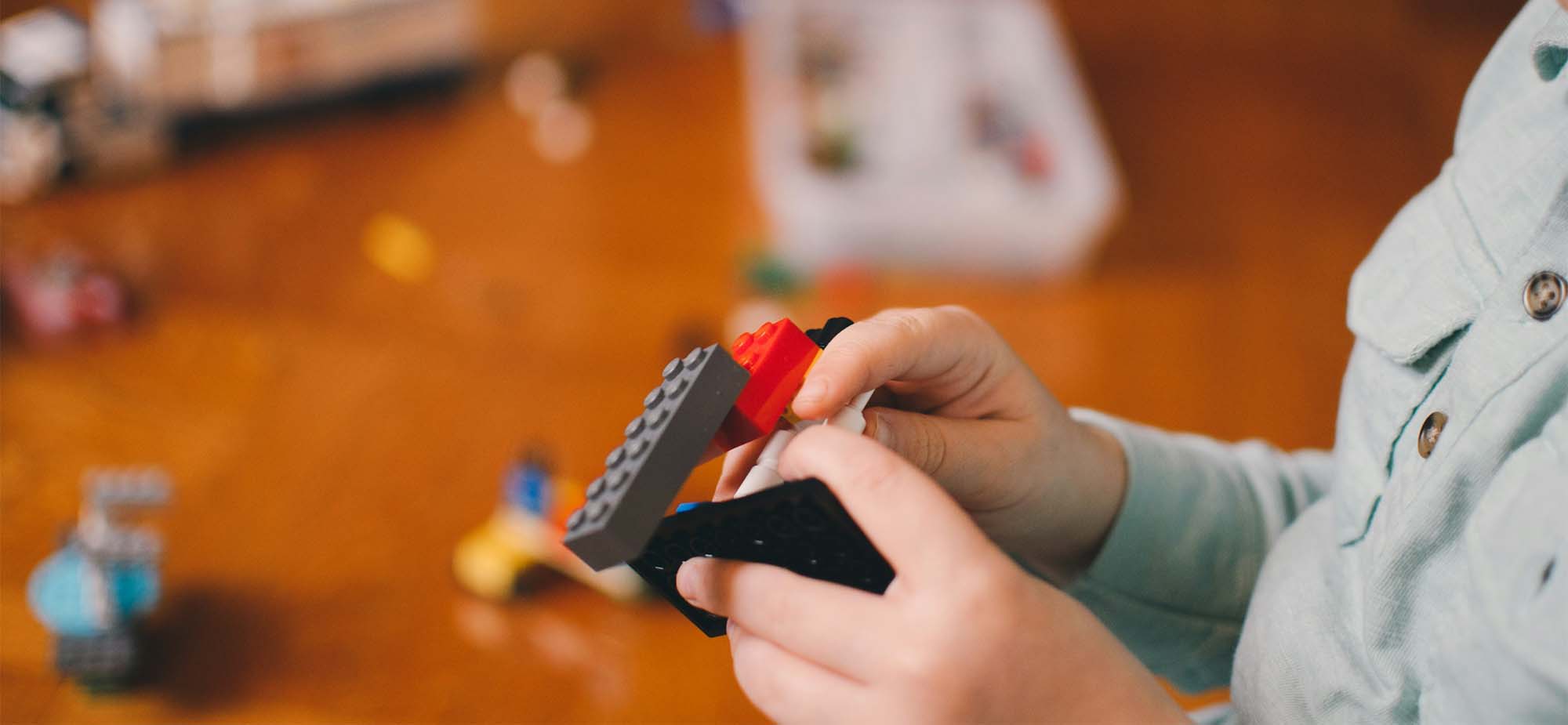 A child plays with legos